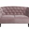 Rian sofa 2 seter stvet rosa med svarte ben.