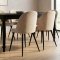Amaretta matgrupp bord svart 6 stolar sammet beige.