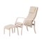 Gr�t� f�t�lj med fotpall beige.