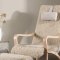 F�r� fauteuil met voetenbankje bruin.