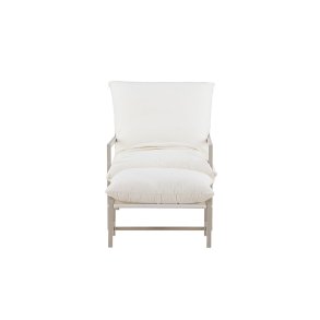 Poltrona Corso con poggiapiedi beige.