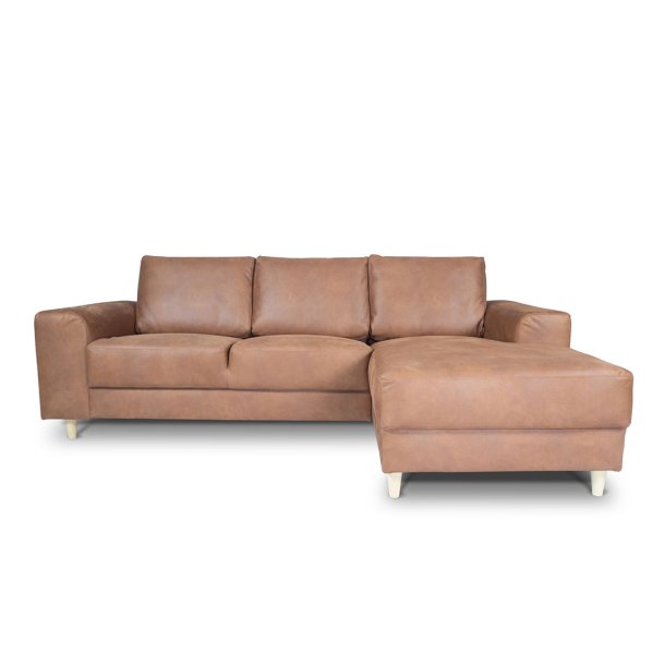 Nordic sofa med sjeselong hyrevent cognacfarget skinn.