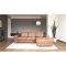 Nordic sofa med sjeselong hyrevent cognacfarget skinn.