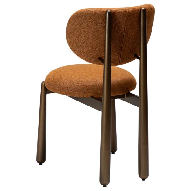 Woke Dan-Form matstol bouclé bränd orange.